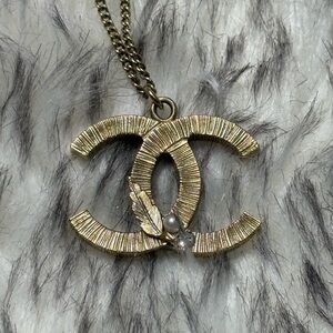 CHANEL Gold Textured Pendant Necklace